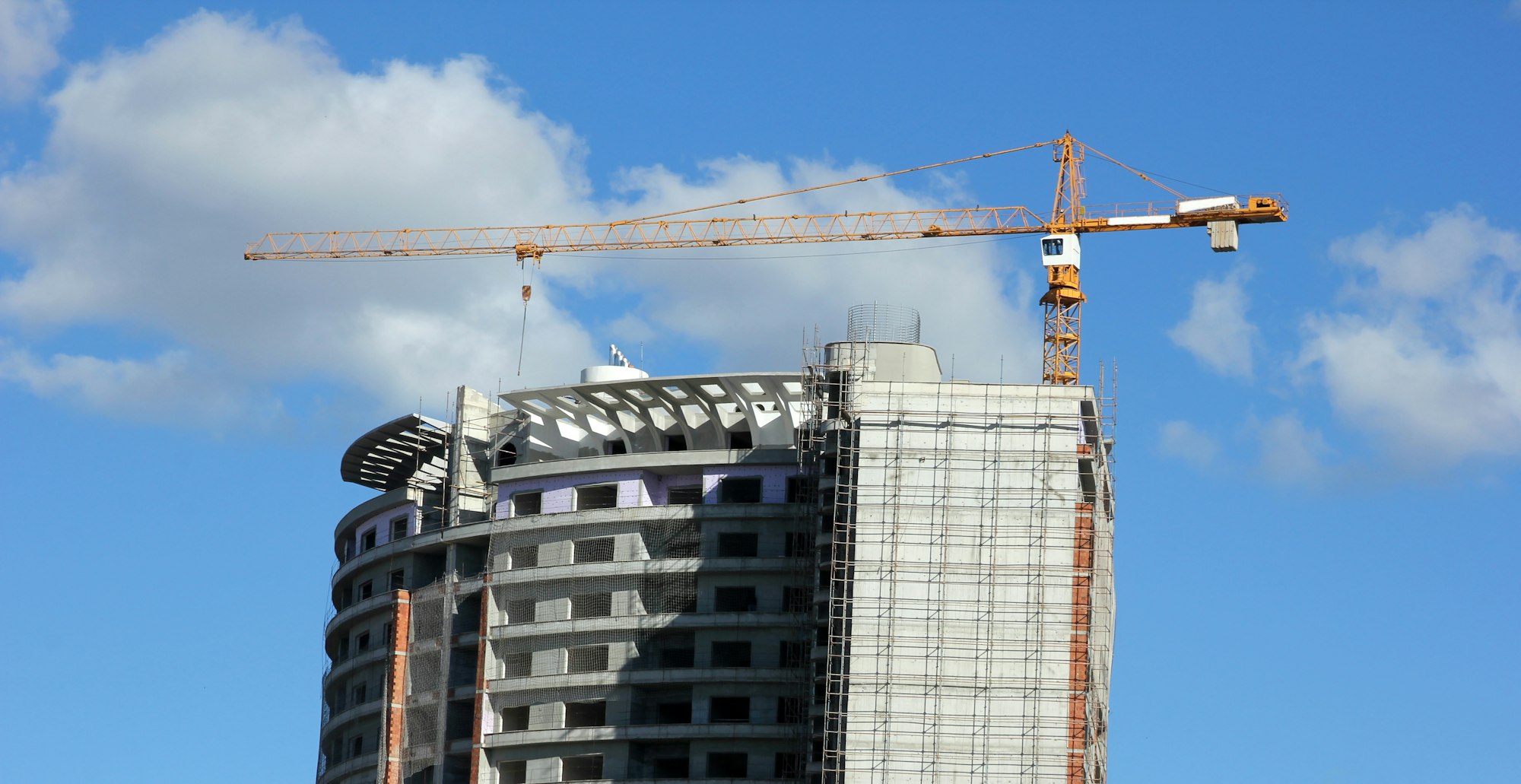 Large construction site and crane